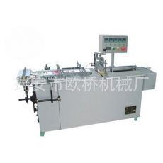 半自動透明膜三維包裝機(jī)、煙條、香煙、化妝品包裝 安全套包裝機(jī)